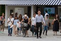 Japanese people crossing the road at pedestrian crossing