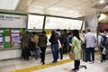 Japanese people and foreign travelers passenger wait and stand in queue for buy ticket MRT trains from auto vending machine Royalty Free Stock Photo