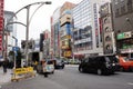 Japanese people and foreigner traveler walk visit with traffic road of chuo dori street at Ueno city in Tokyo, Japan Royalty Free Stock Photo