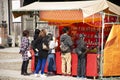 Japanese people and foreigner travelers playing shooting game in street market festival at Narita of Chiba in Tokyo, Japan Royalty Free Stock Photo