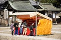 Japanese people and foreigner travelers playing shooting game in street market festival at Narita of Chiba in Tokyo, Japan Royalty Free Stock Photo