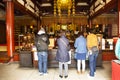 Japanese people and foreigner travelers praying buddha god of Marishiten Tokudaiji Temple in Ameyoko at Ueno in Tokyo, Japan Royalty Free Stock Photo