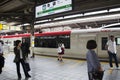 Japanese people and foreigner traveller waiting train and subway Royalty Free Stock Photo