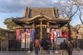 Japanese people praying in front of Daikokudo temple in the Ueno park