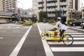 Japanese people riding new innovation bicycle waiting traffic s