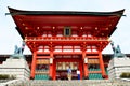 Japanese people and traveler foreigner walking to inside of Fushimi Inari taisha shrine for visit and pray