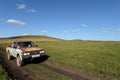 Japanese pickup Datsun 720 in the foothills of the Altai mountains