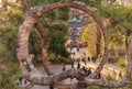 Japanese pine band with burlap binding it into a circle that evokes the moon