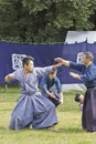 Japanese playing martial arts in a park in Tokyo