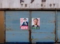 Japanese political posters on the door of a closed grocery