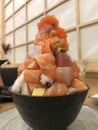 Japanese popular mix seafood salmon sashimi mountain don on bowl dish Royalty Free Stock Photo