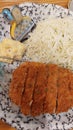 Japanese Pork Katsu Lunch Set Arranged on Dining Table.