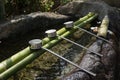 Japanese purification water and stainless ladles Royalty Free Stock Photo