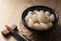 Japanese Rakkyo placed on a wooden background