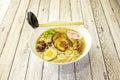 Japanese ramen dish with hazelnuts, noodles, bean sprouts, Asian mushrooms, boiled egg