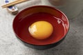 Japanese raw egg in a bowl close up Royalty Free Stock Photo