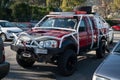 Japanese red pickup truck Nissan Navara ready for an exhibition