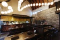 Japanese restaurant counter with chef. Decorated with Japanese lamps on ceiling