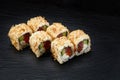 Japanese restaurant menu photo, seafood, national cuisine. Tuna and cheese sushi rolls set served on black plate, food Royalty Free Stock Photo