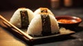 Japanese rice balls or onigiri on a dark background. Close-up photography. Generative AI