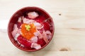 Japanese Rice with Maguro, Otoro and ikura& x28;Salmon eggs& x29; on wood Royalty Free Stock Photo