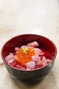 Japanese Rice with Maguro, Otoro and ikura& x28;Salmon eggs& x29; on wood Royalty Free Stock Photo