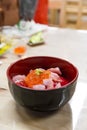 Japanese Rice with Maguro, Otoro and ikura& x28;Salmon eggs& x29; on wood Royalty Free Stock Photo