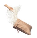 Japanese Rice in sack bag flying explosion, white grain rices fall abstract fly. Beautiful complete seed rice bag splash in air, Royalty Free Stock Photo