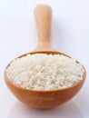 Japanese rice, the short rice used for sushi in wooden spoon wit