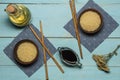 Japanese rice in a wooden bowl. Wooden chopsticks On the table of a bamboo mat. Asian cuisine. View from above. Royalty Free Stock Photo