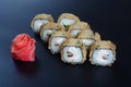 Japanese rice rolls with fish and ginger Royalty Free Stock Photo