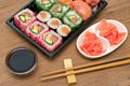 Japanese rolls and sushi, soy sauce and pickled ginger Royalty Free Stock Photo