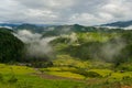Japanese rural landscape with rice terraces in mountain forest Royalty Free Stock Photo