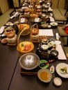 Japanese ryokan kaiseki dinner sets serve in family private room including appetizer such as cherry blossom tofu, pork shabu