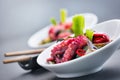 Japanese salad with octopus and ginger. Healthy food. Seafood closeup over black