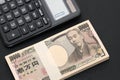 Japanese salary envelope and calculator Royalty Free Stock Photo