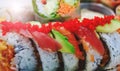Japanese Sashimi Sushi Rolls With Salmon Roe In Close Up Picture. Donburi In Asian Style Food. Shrimp With Rice In Close-up Image