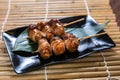 Japanese sausage wrapped with pork belly Kushiyaki, Skewered and Grilled Meat