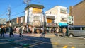 Japanese schoolgirls and other people walking in streets of Kyoto, Japan Royalty Free Stock Photo