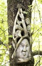 Japanese sculpture on a tree