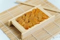 Japanese sea urchin in wooden tray , sushi and sashimi ingredients Royalty Free Stock Photo