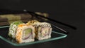 Japanese seafood sushi, rolls with tuna, salmon, avocado. California roll. Royalty Free Stock Photo