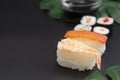 Japanese seafood sushi set on black background isolated, copy space Royalty Free Stock Photo