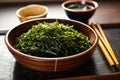 japanese seaweed salad in a classic bamboo serving dish Royalty Free Stock Photo