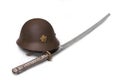 Japanese sergeant's sword and battle helmet Royalty Free Stock Photo