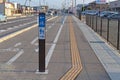 A Japanese sidewalk sign for cyclist and pedestrians