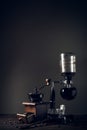 Japanese siphon coffee maker and coffee grinder Royalty Free Stock Photo