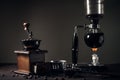 Japanese siphon coffee maker and coffee grinder Royalty Free Stock Photo