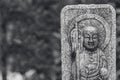 Japanese stone buddha statue Royalty Free Stock Photo