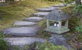 Japanese stone lantern in the garden Royalty Free Stock Photo